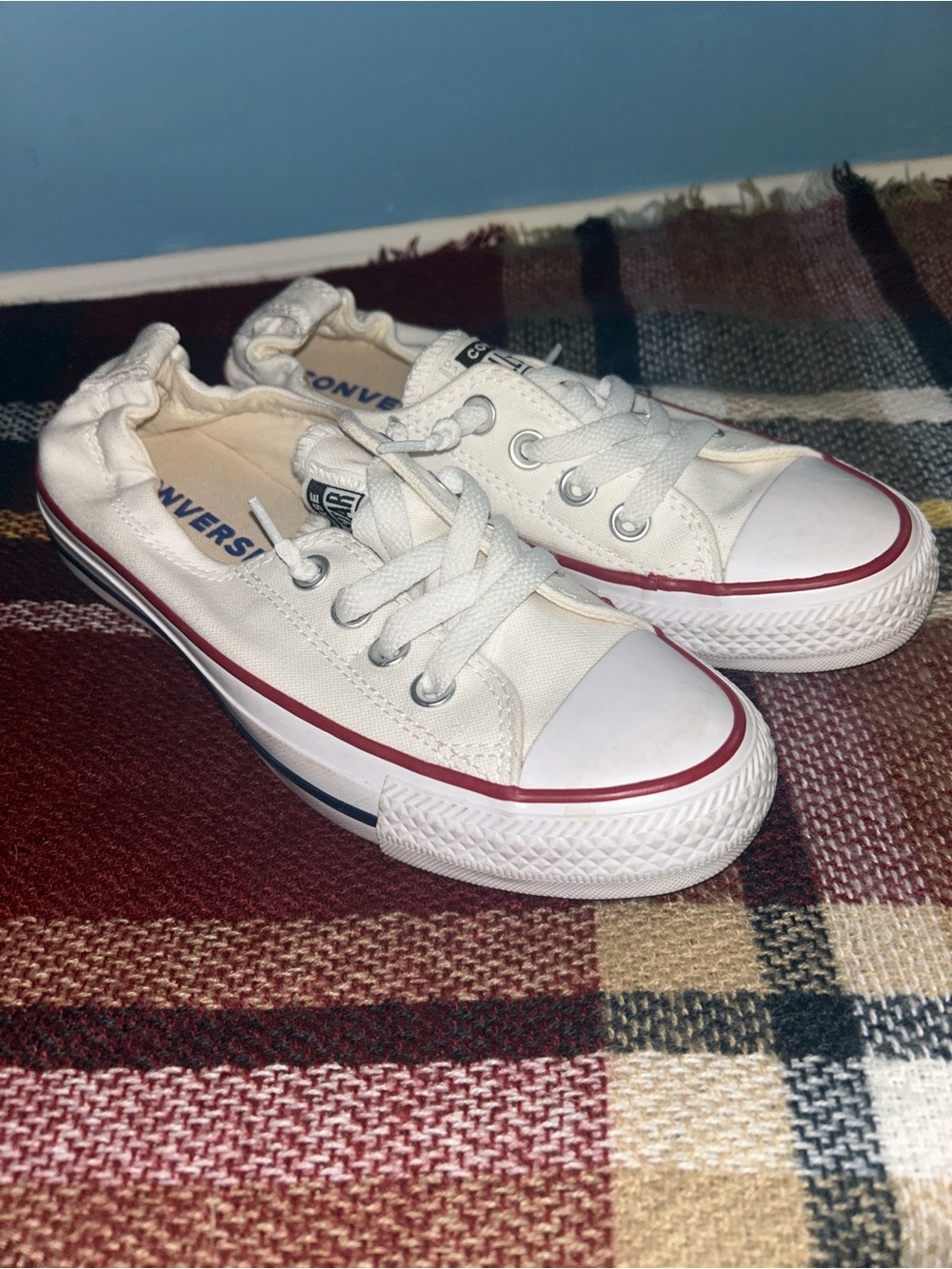 Women’s size 6 Converse Low Top Canvas Sneakers in White with Red and Blue Trim